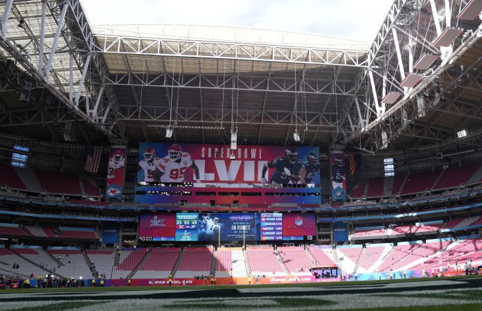 A general view of the field and signage in the venue before Super Bowl LVII between the Kansas City Chiefs and Philadelphia Eagles at State Farm Stadium