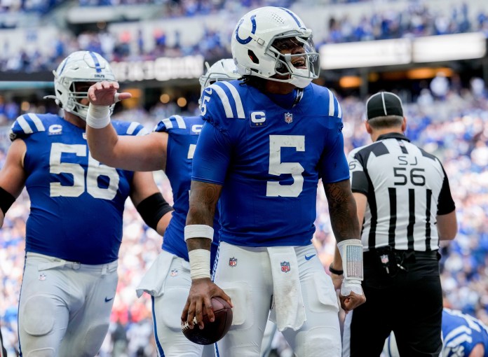 Indianapolis Colts quarterback Anthony Richardson (5) celebrates after scoring a touchdown on Sunday, September 8, 2024, during a game against the Houston Texans at Lucas Oil Stadium in Indianapolis.