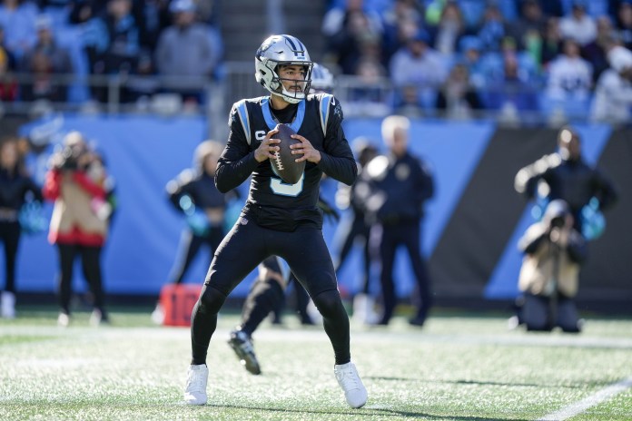 Carolina Panthers quarterback Bryce Young (9) drops back to pass against the Tampa Bay Buccaneers during the first quarter at Bank of America Stadium on January 7, 2024.