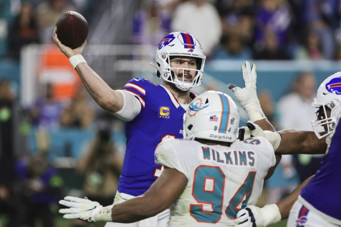 Buffalo Bills quarterback Josh Allen (17) throws the football against the Miami Dolphins during the fourth quarter at Hard Rock Stadium on January 7, 2024.