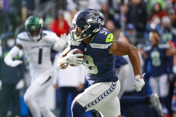 Seattle Seahawks running back Kenneth Walker III (9) rushes against the New York Jets during the first quarter at Lumen Field on January 1, 2023.