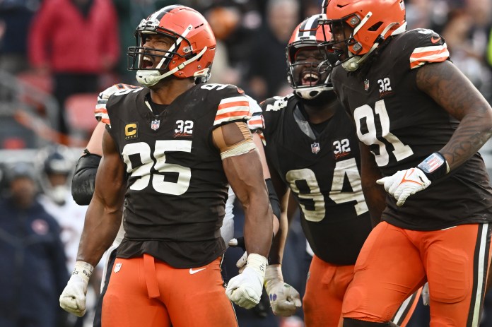 Cleveland Browns defensive end Myles Garrett (95) celebrates after making a tackle during the second half of the game against the Chicago Bears at Cleveland Browns Stadium on December 17, 2023.