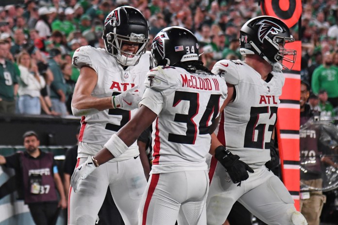 Atlanta Falcons wide receiver Drake London (5) celebrates his game-tying touchdown with wide receiver Ray-Ray McCloud III (34) late in the fourth quarter against the Philadelphia Eagles at Lincoln Financial Field on September 16, 2024.