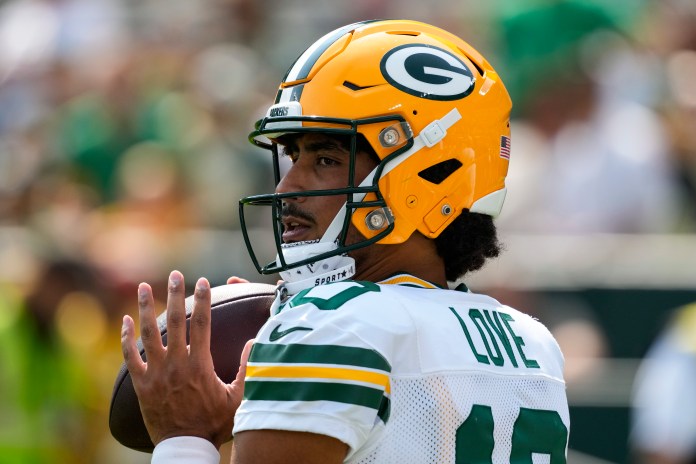 Green Bay Packers quarterback Jordan Love (10) throws a pass during warmups prior to the game against the Baltimore Ravens at Lambeau Field on August 24, 2024.