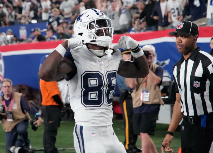Dallas Cowboys wide receiver CeeDee Lamb (88) celebrates after scoring a touchdown against the New York Giants during the first half at MetLife Stadium on September 26, 2024.