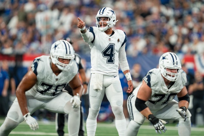 Sep 26, 2024; East Rutherford, NJ, US; Dallas Cowboys quarterback Dak Prescott (4) calls out the defense prior to the snap of the ball at MetLife Stadium. Mandatory Credit: Julian Guadalupe-NorthJersey.com