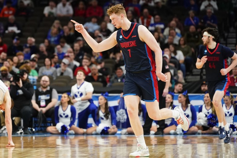 Predicting College Basketball Team Improvement or Decline