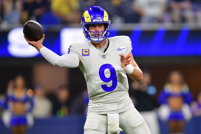 Los Angeles Rams quarterback Matthew Stafford (9) throws against the Minnesota Vikings during the first half at SoFi Stadium