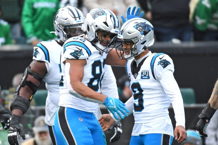 Carolina Panthers tight end Tommy Tremble celebrates his touchdown catch with quarterback Bryce Young