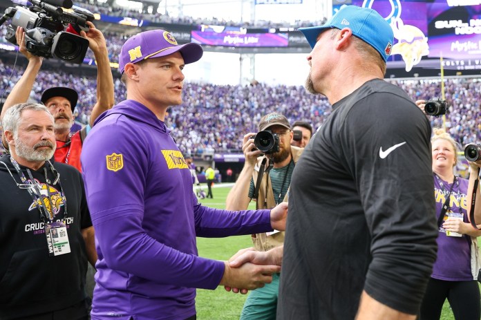 Minnesota Vikings head coach Kevin O'Connell and Detroit Lions head coach Dan Campbell shake hands after the game at U.S. Bank Stadium on October 20, 2024